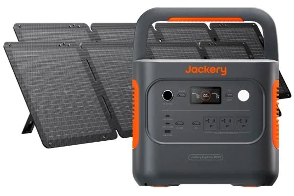 Jackery Explorer 2000 v2 portable power station with black and orange design, displayed alongside foldable solar panels.