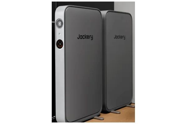 Two slim gray Jackery FridgeGuard battery backup units positioned side by side for refrigerator emergency power protection.
