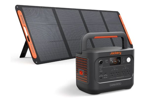 Jackery HomePower 1000 Plus v2 portable power station displayed in front of a folding solar panel.