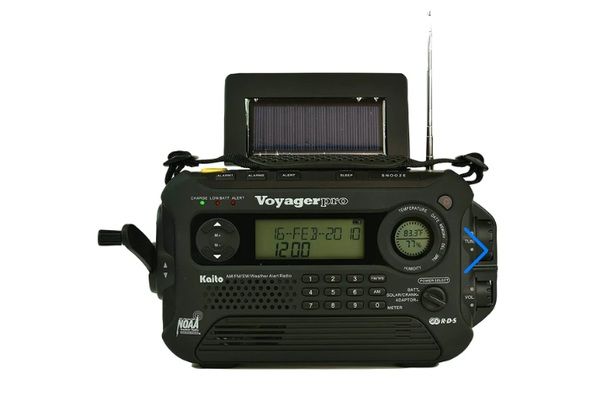 Kaito KA600L Voyager Pro emergency radio with solar panel, hand crank, NOAA weather alerts, and digital display.