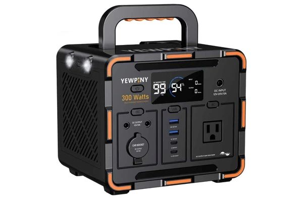 Black and orange YEWPINY EM300 portable power station with carrying handle, digital display, USB ports, AC outlet, and built-in LED lights.